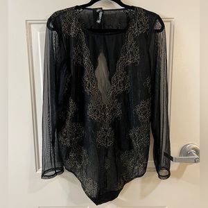 NWT Torrid black and gold mesh thong bodysuit